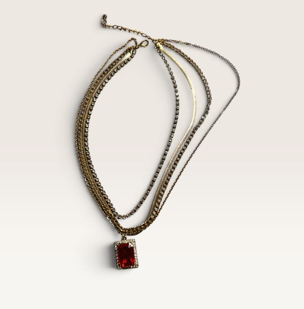 Layered Gold-Tone Multi-Strand Necklace with Red Rhinestone Pendant